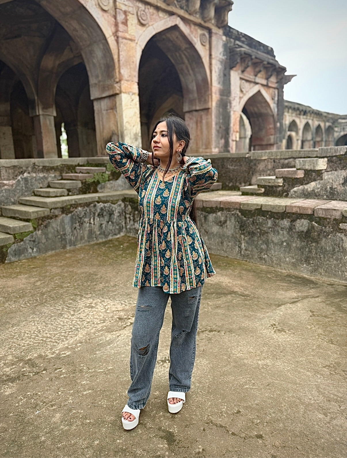 Traditional Sanganeri-style paisley and floral motifs Short kurti
