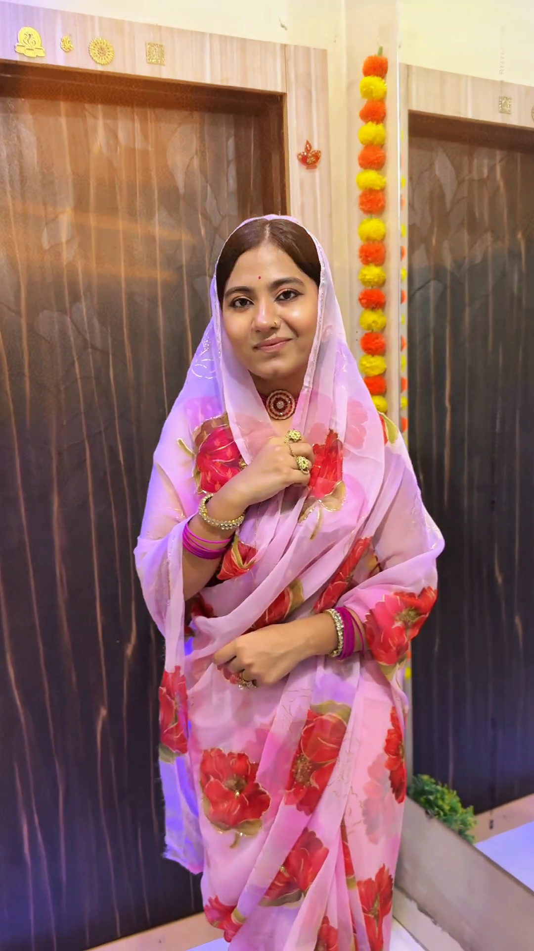 Blush Pink Floral Organza Saree with Bold Red Rose Prints