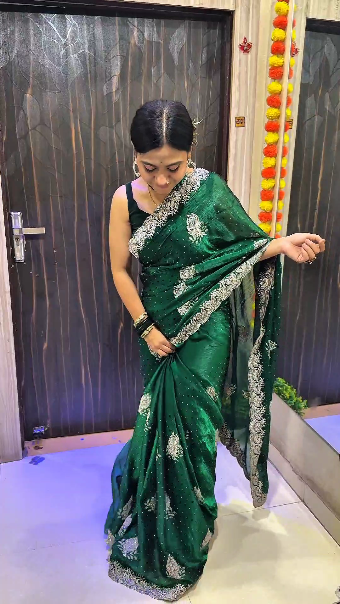Jimmy Choo Emerald Green Designer Saree with Silver Zari Work