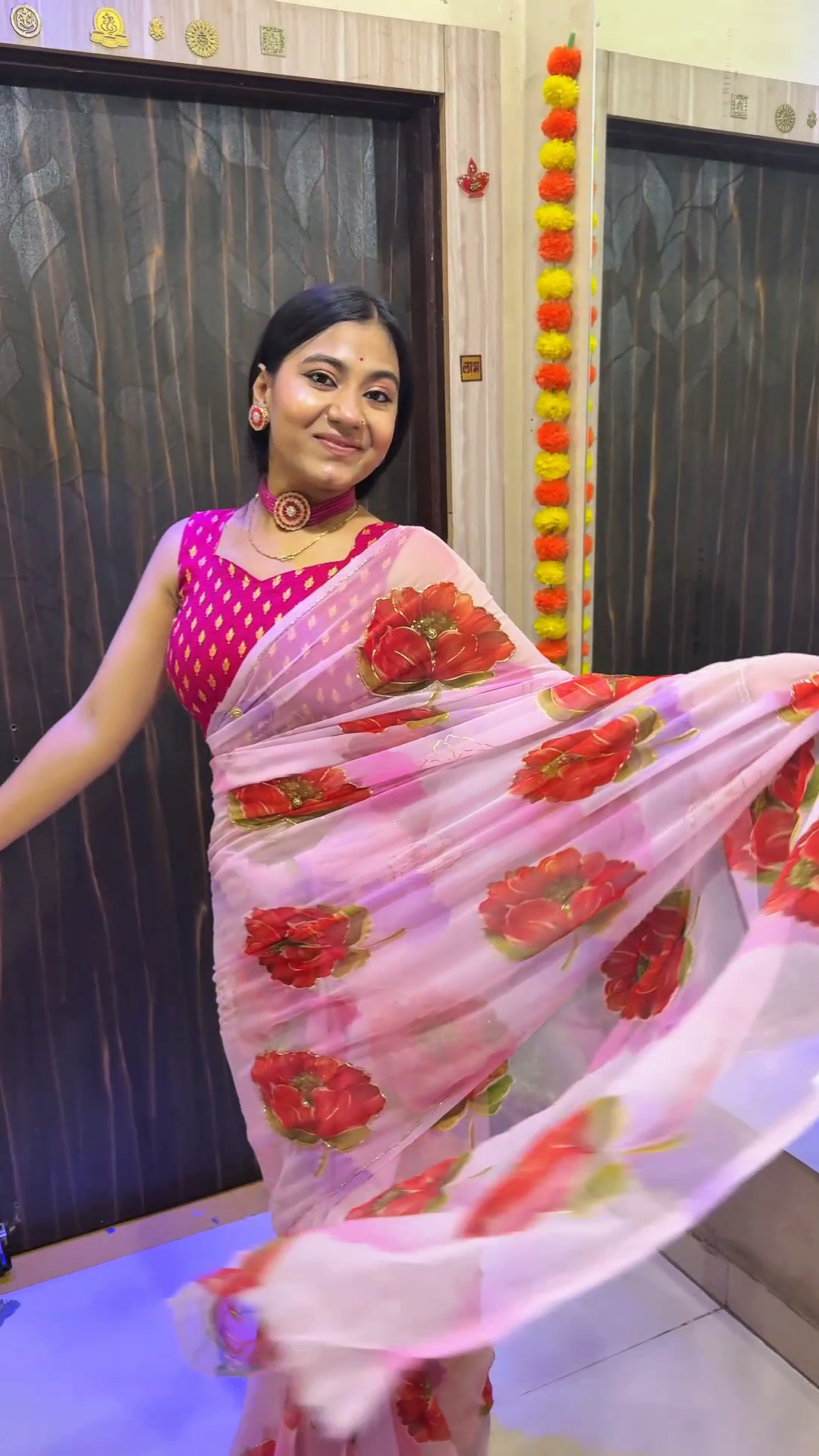 Blush Pink Floral Organza Saree with Bold Red Rose Prints