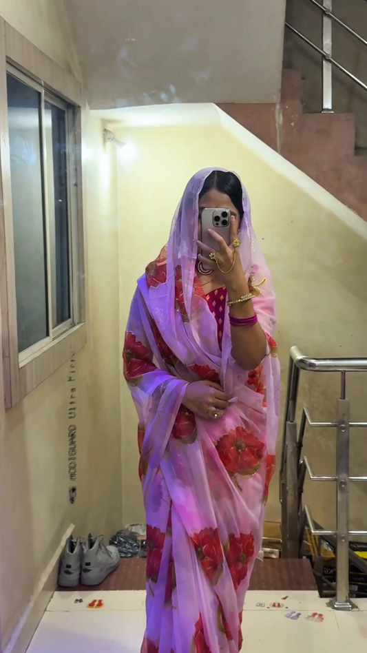 Blush Pink Floral Organza Saree with Bold Red Rose Prints