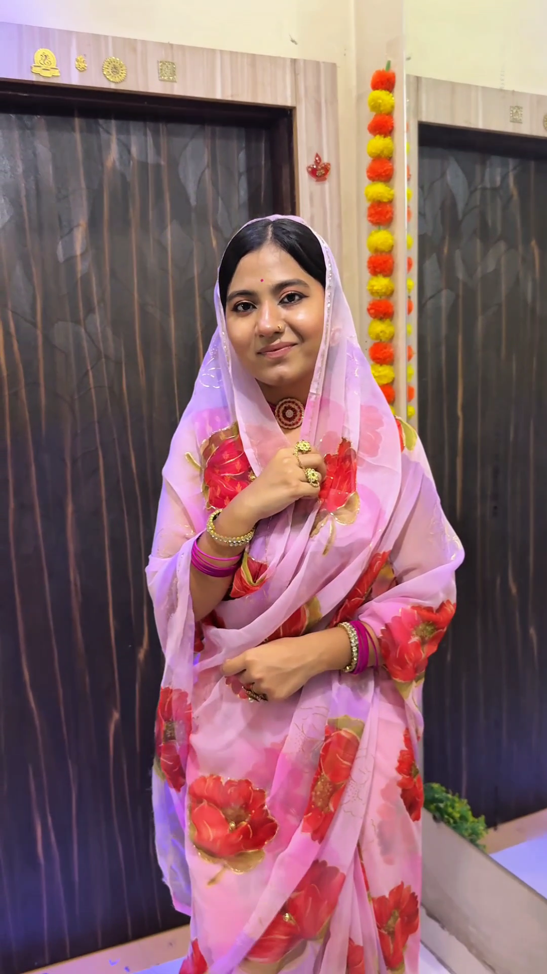 Blush Pink Floral Organza Saree with Bold Red Rose Prints