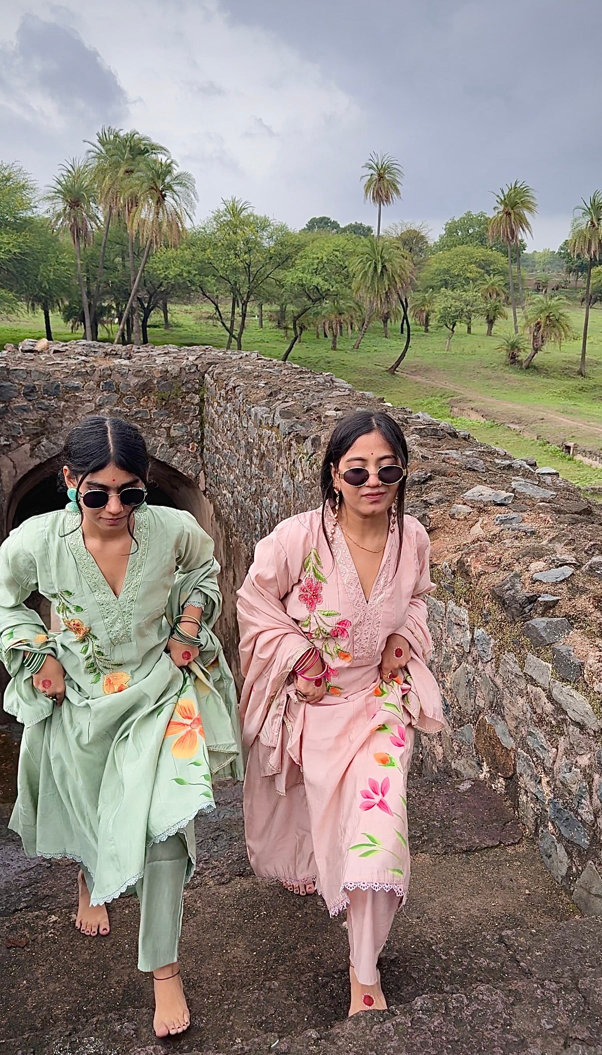 Soft peach Anarkali with multicolor hand-painted floral motifs