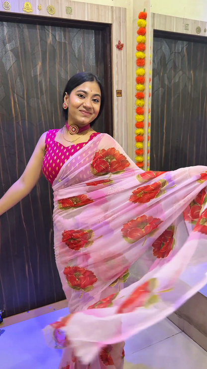 Blush Pink Floral Organza Saree with Bold Red Rose Prints